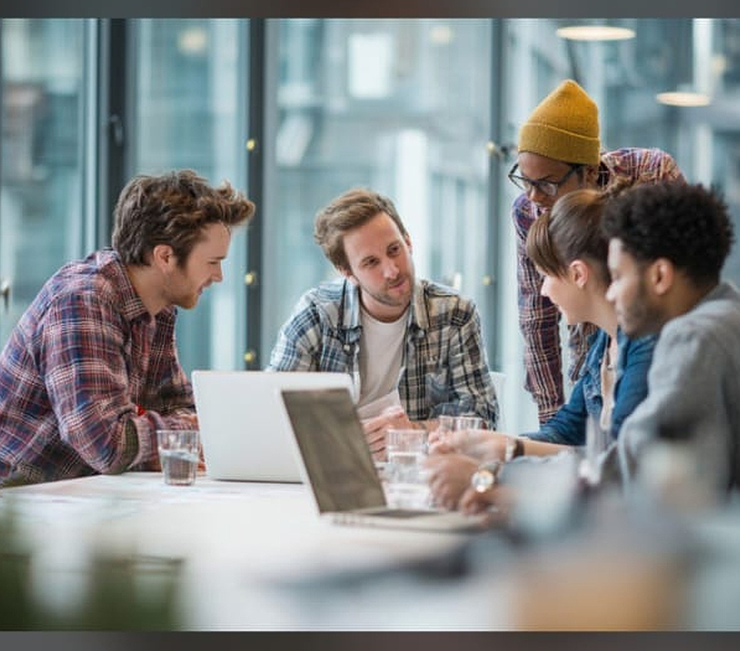 Growing business team at work